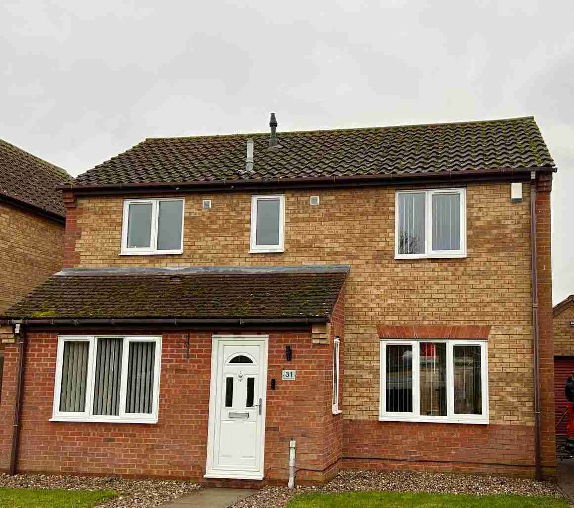 Dirty-red-roof-tiles-before-roof-cleaning-in-Suffolk