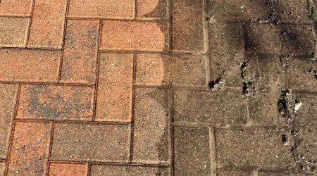 Half clean half dirty driveway in Suffolk